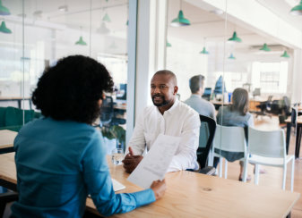 man and woman talking